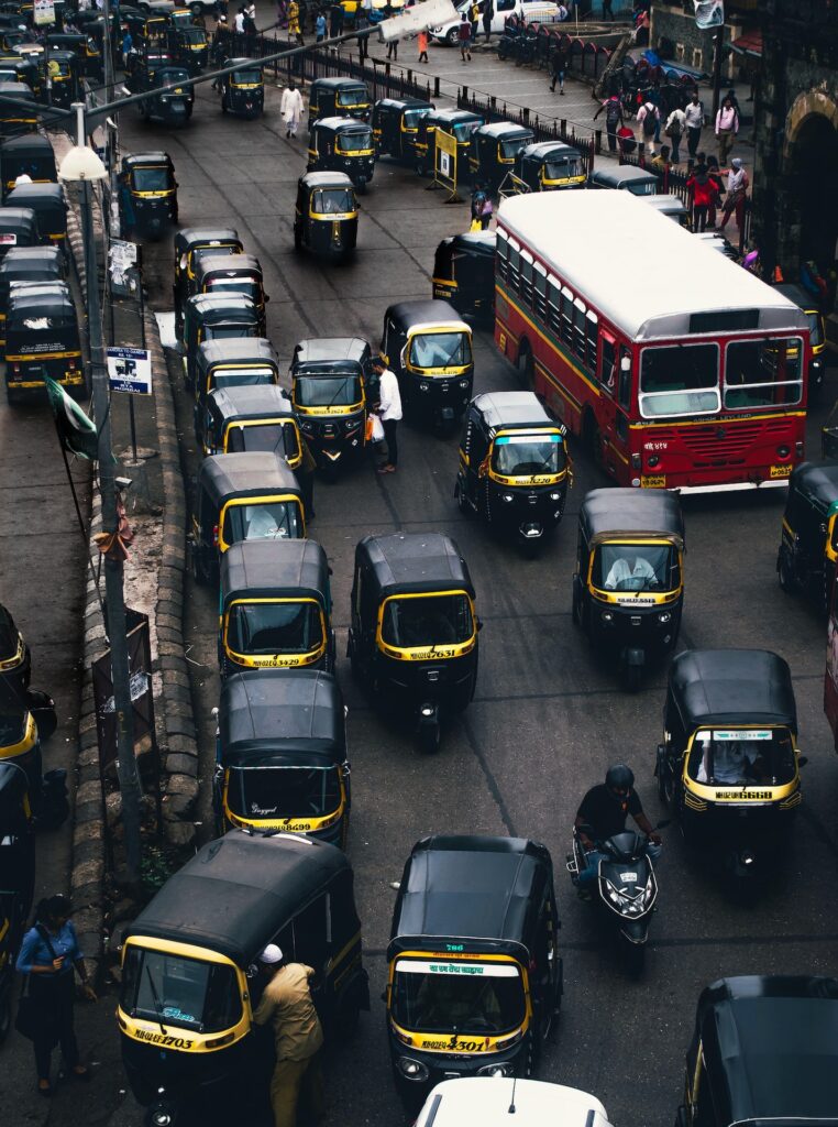 aerial photo showing auto rickshaw traffic with one bus near dadar station in mumbai maharashtra